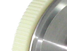 Textured plastic encoder wheel